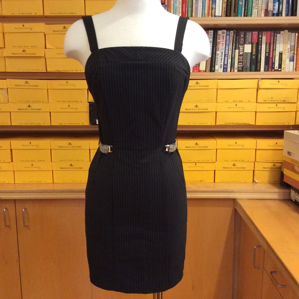Sexy and sophisticated pin striped dress. Size 2